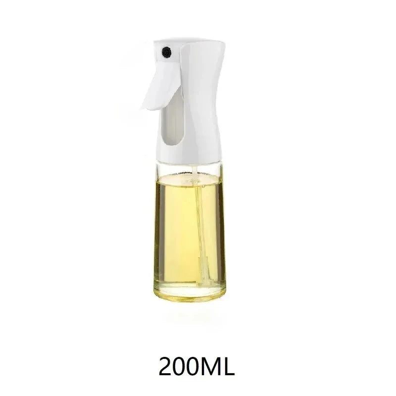 Clear spray bottle with a white nozzle and yellow liquid, placed on a clean white background