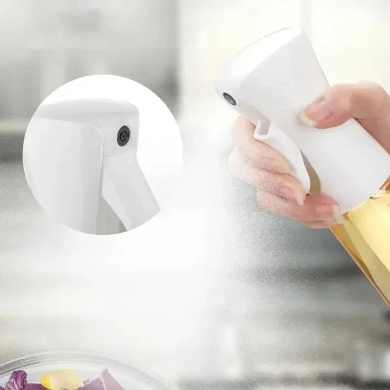 "White handheld device with a built-in camera lens, held above a transparent glass container, possibly for scanning or inspection purposes."