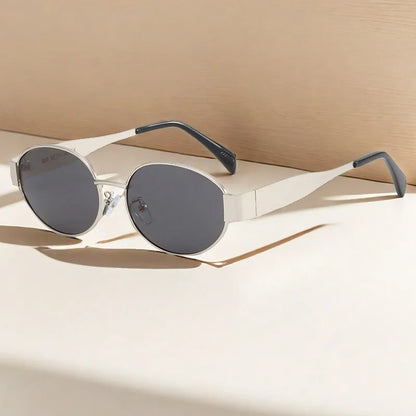 Retro-style sunglasses for women – silver frame, UV protection, dark lenses