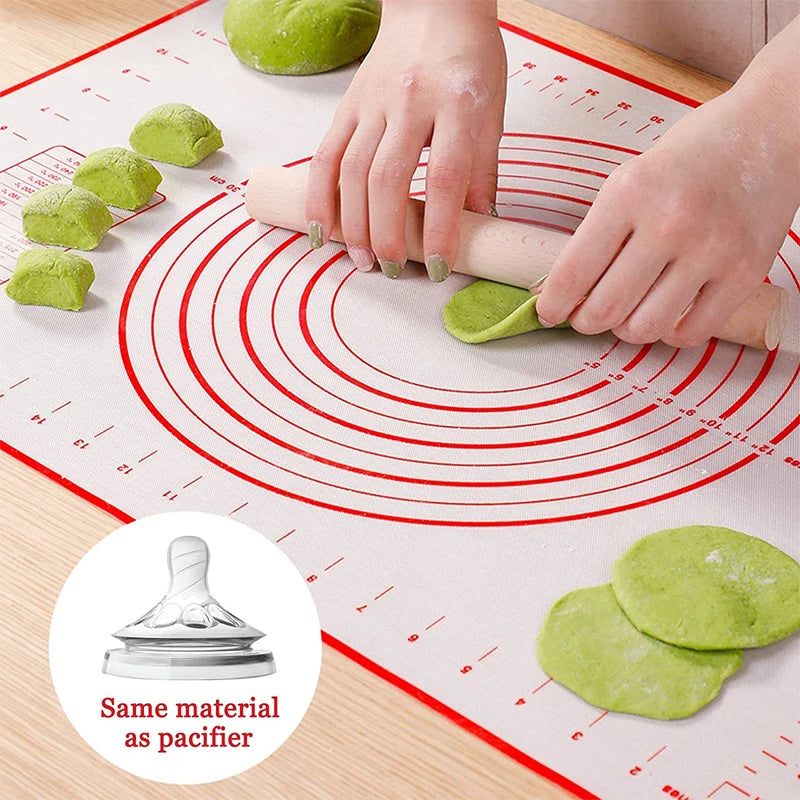
"Close-up of a person rolling out green dough on a high-quality silicone baking mat, highlighting the mat’s non-stick textured surface."


