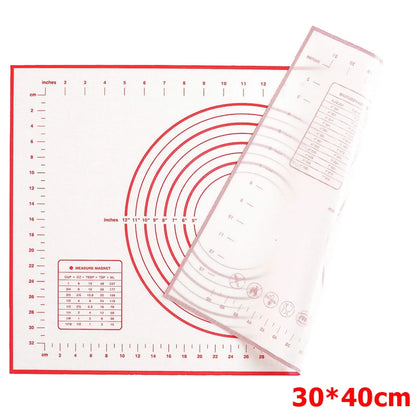 
"Baking mat with printed measurement scale and integrated ruler, displayed on a clean white background."