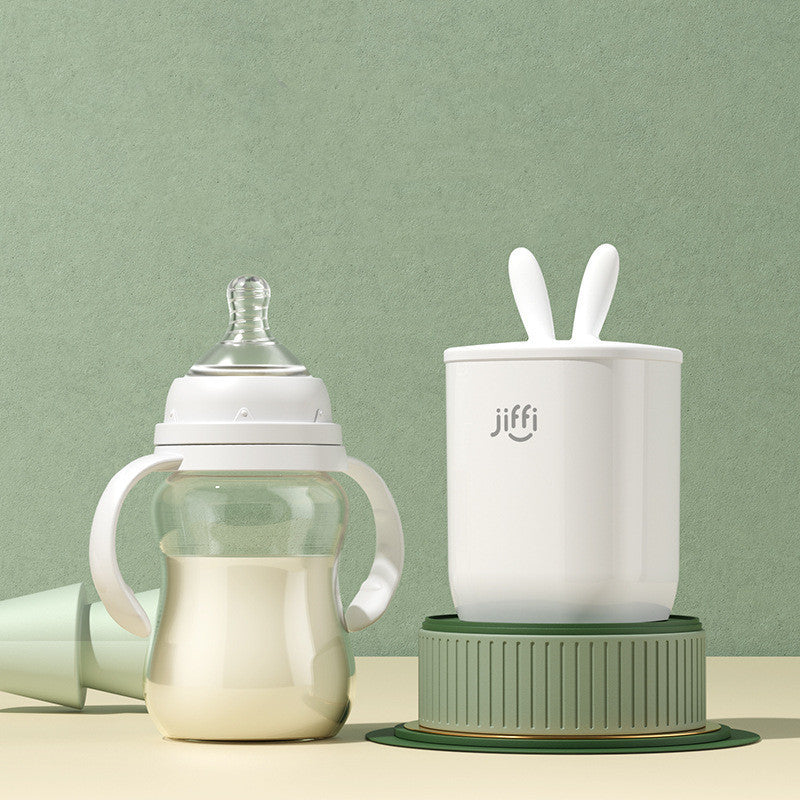 
"Baby bottle and formula container with 'jiffy' branding, displayed on a light green background, ideal for infant feeding and storage."