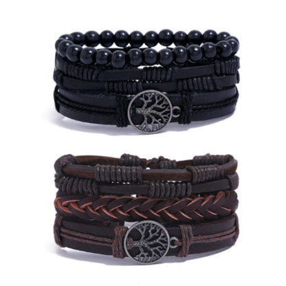 
Two braided leather bracelets in black and brown with Tree of Life charm on white background – unisex spiritual accessory