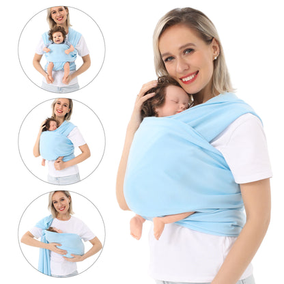 
"Promotional image of a gray baby carrier wrap with a baby dummy inside, set against a cozy family scene where parents and two children are spending quality time together."